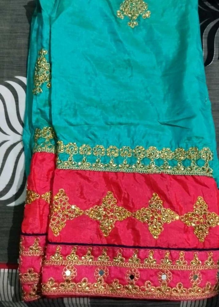 Elegant Turquoise and Pink Saree