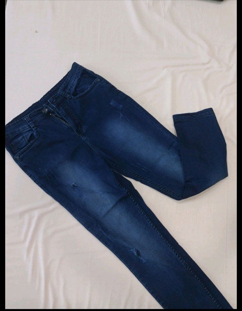 Dark Blue Ripped Jean.