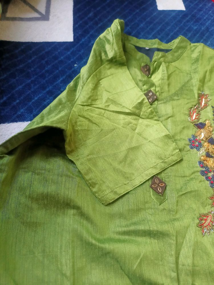 Green Unused Kurti With Embroidery Work With Stones On It