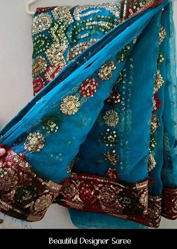 Beautiful Net Shining Saree With Grand Work