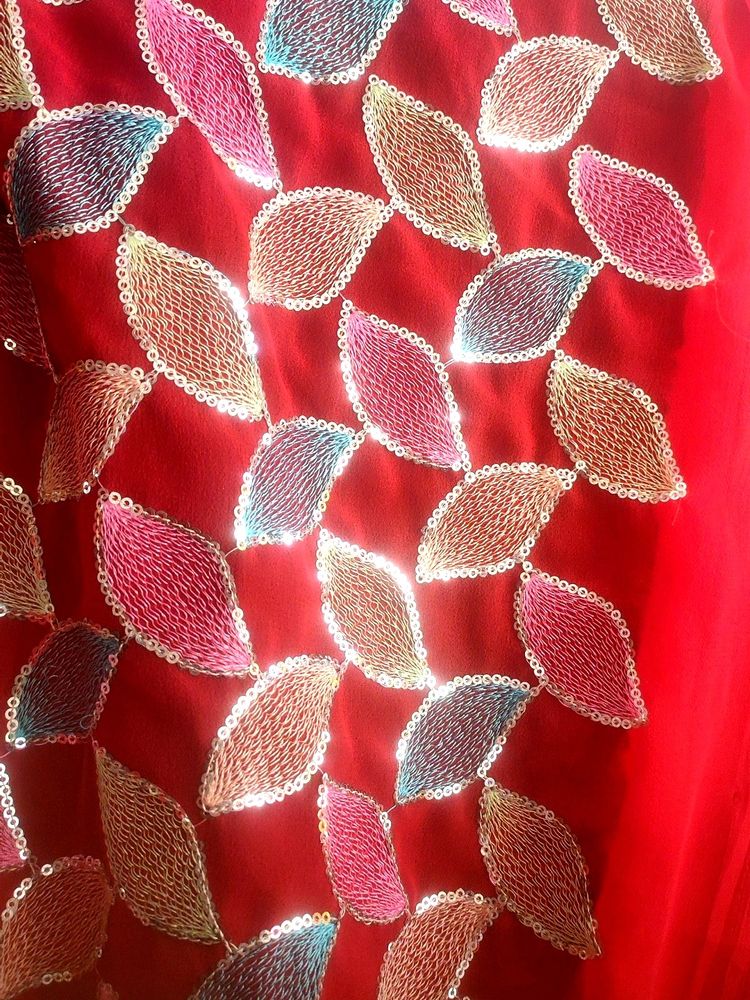 A Beautiful Red Colour Plain Saree With Designer B