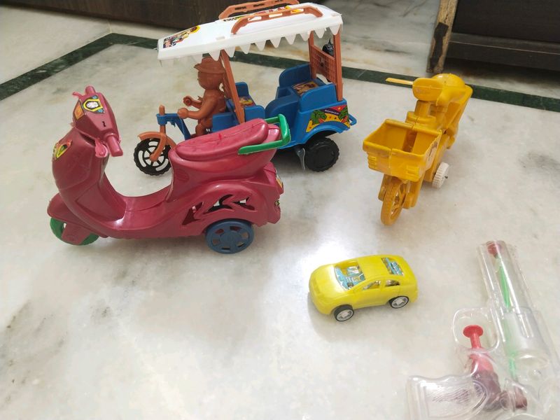 9 Toys E-rickshaw, Scooter, Cycle, Car And More