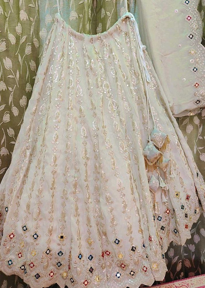 Off White Engagement Lehnga