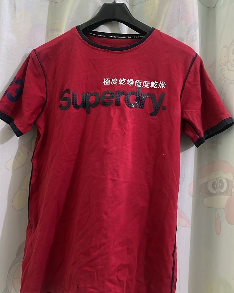 A T Shirt With Red Colour Nd Superdry Company