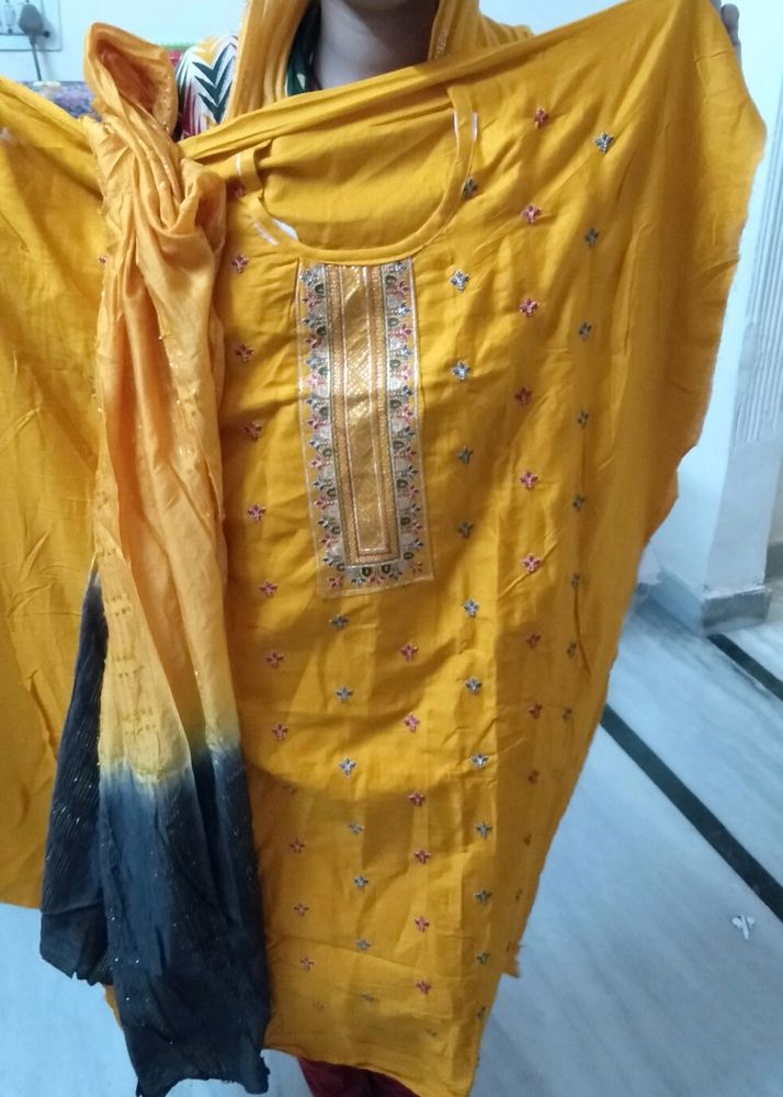 Two Yellow Colour Unstitched Suit At Offer Price