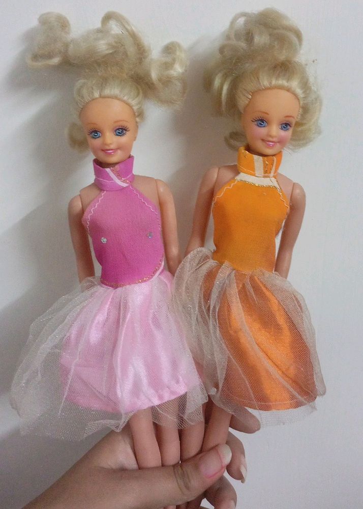 2 Barbie Dolls