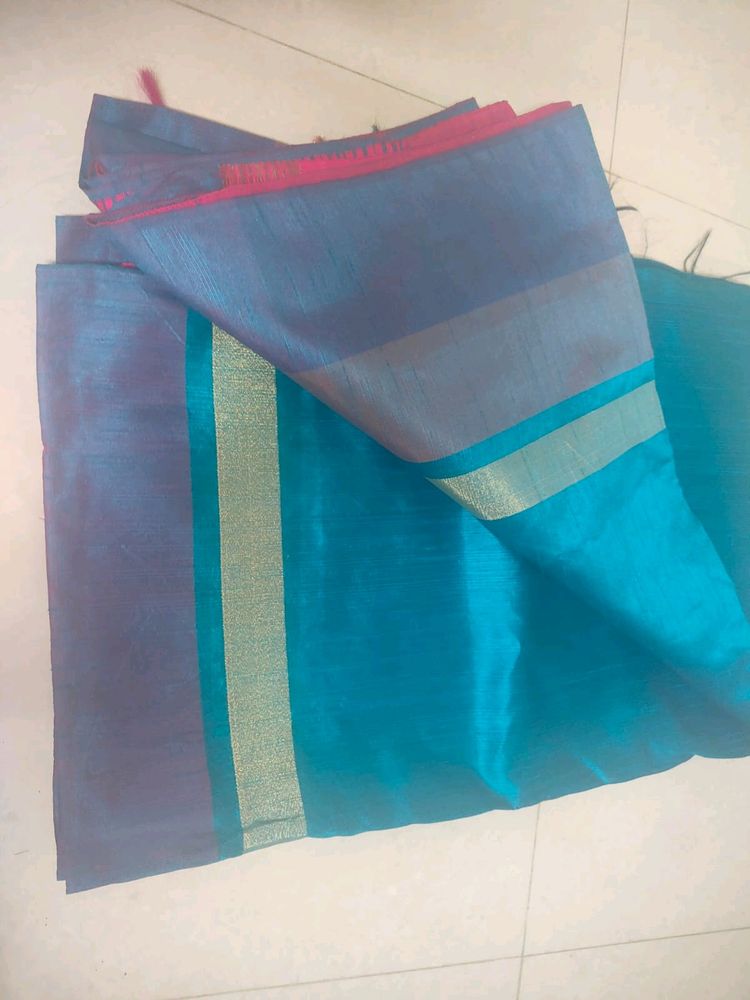 Bright Blue Silk Saree With Pink Border And Pallu