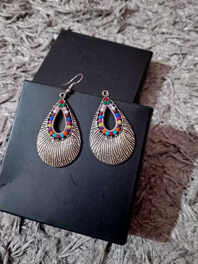 Small Feather like Metal Earrings