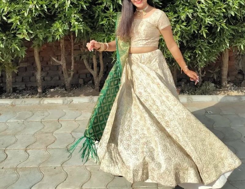 Cream Colour Lehenga Choli With Green Dupatta