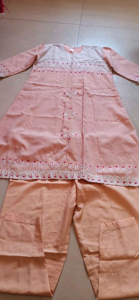 pretty peach colour kurta set for women