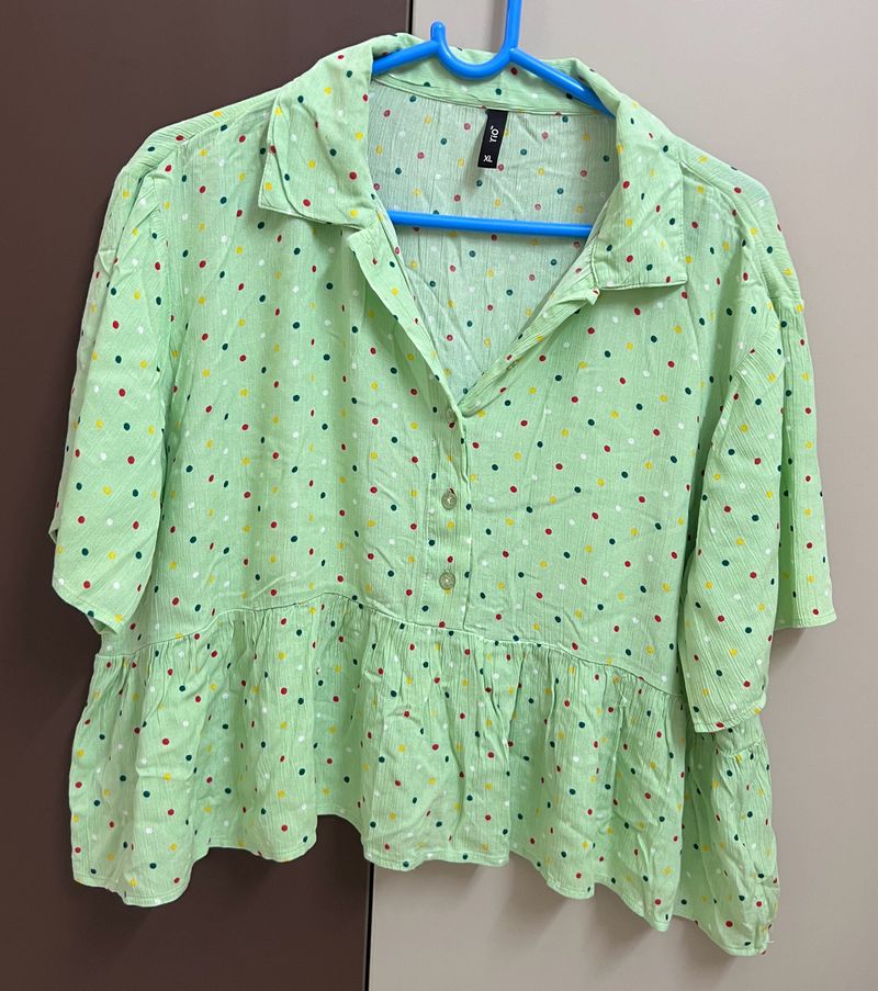 Green Peplum Top With Polka Dots