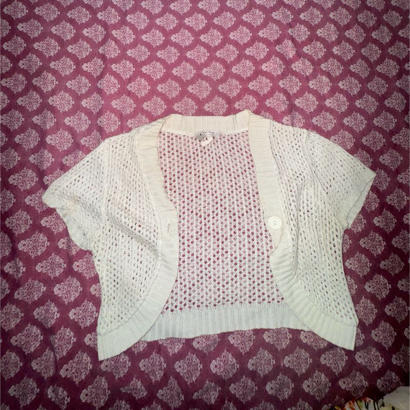 Its a crop pure woolen shrug