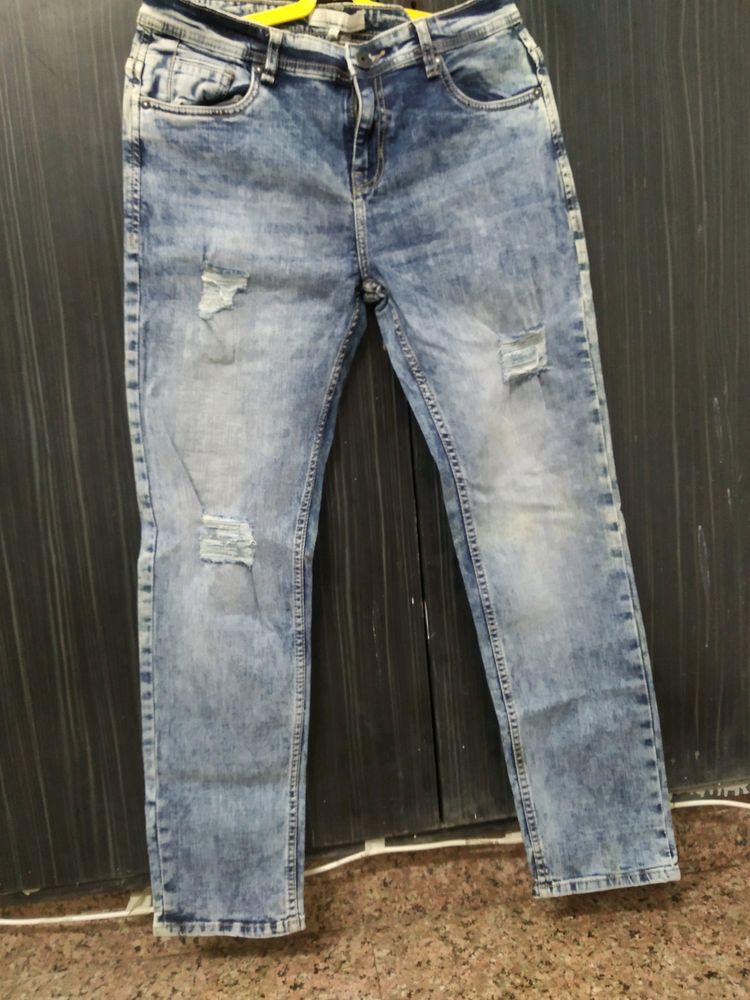 Roadster Indigo Blue Colour Ripped Jeans