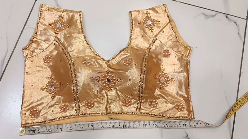 stone worked golden blouse