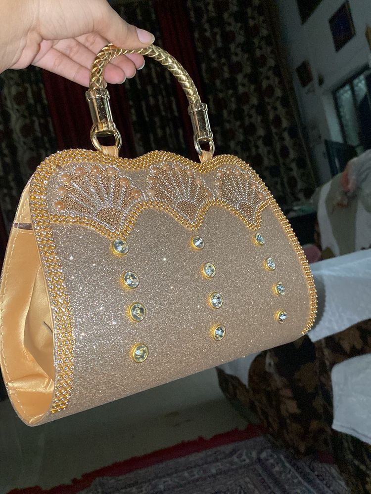 a clutch or uh can say purse for party