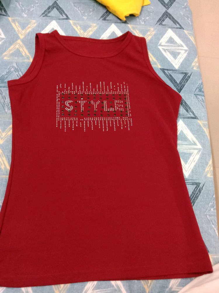 sleeveless top maroon colour with printed design