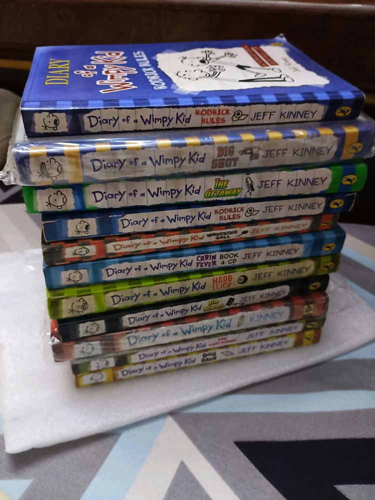 11 Wimpy Kid Books -4hcs ,7pbs