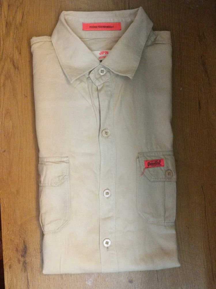 A Professional Shirt With Plain Tan Color