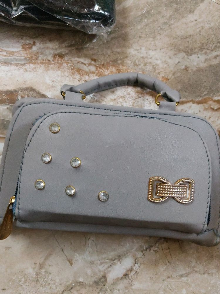 Fancy Handbag With Multiple Chain Pockets