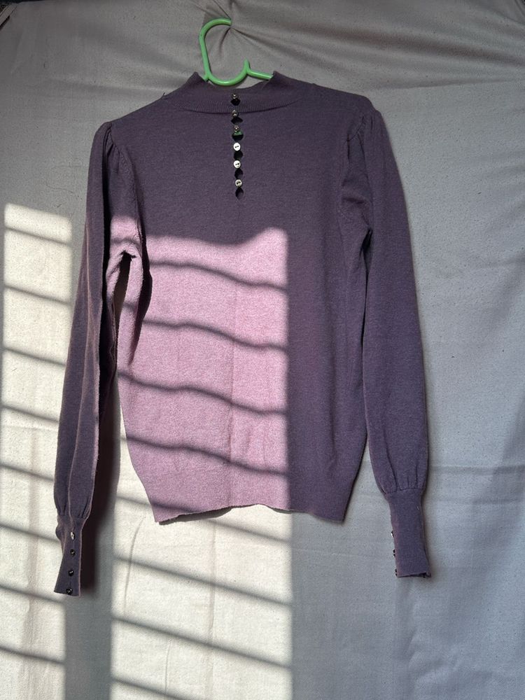 purple sweatshirt