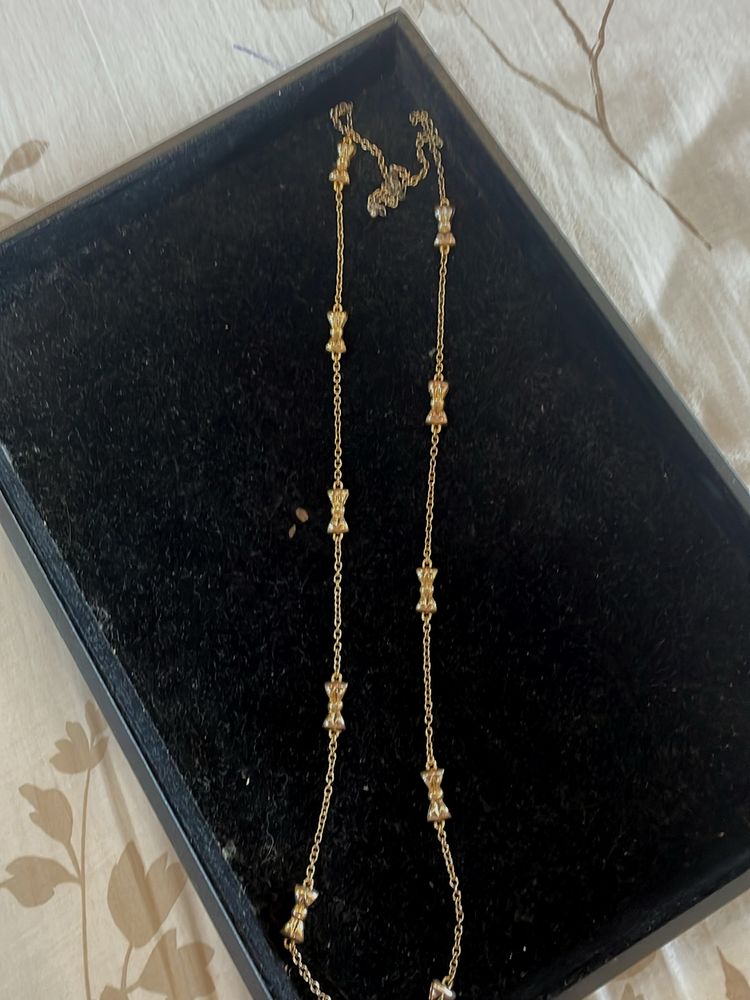 Long Chain With Bow Detail