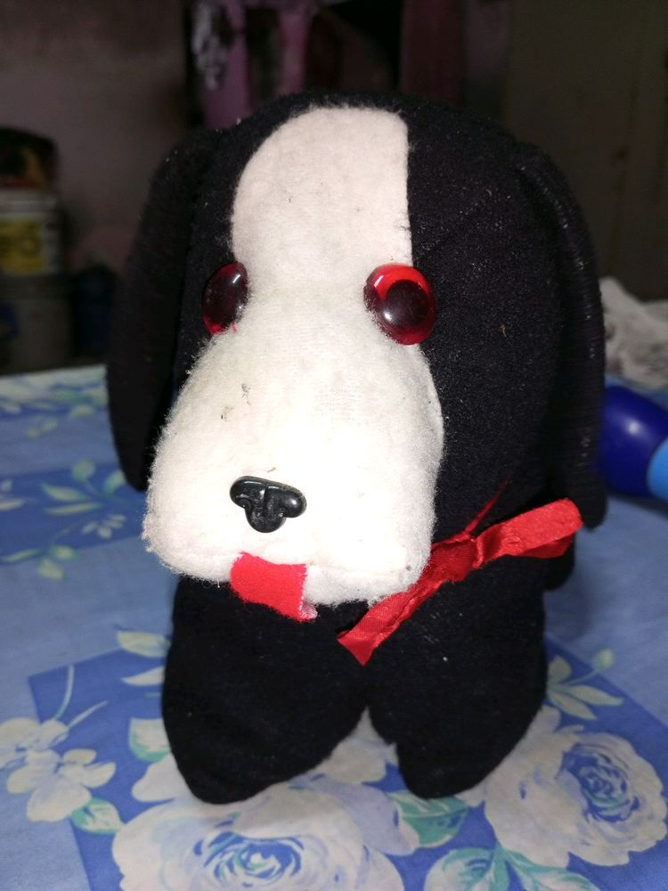 A Qute Black Dog Soft Toy