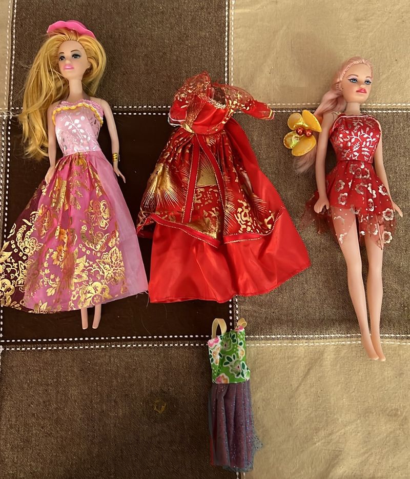 Two Dolls With Dresses