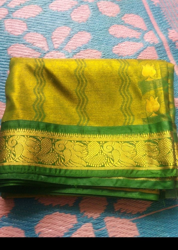 Green Saree With Golden Flowers Design