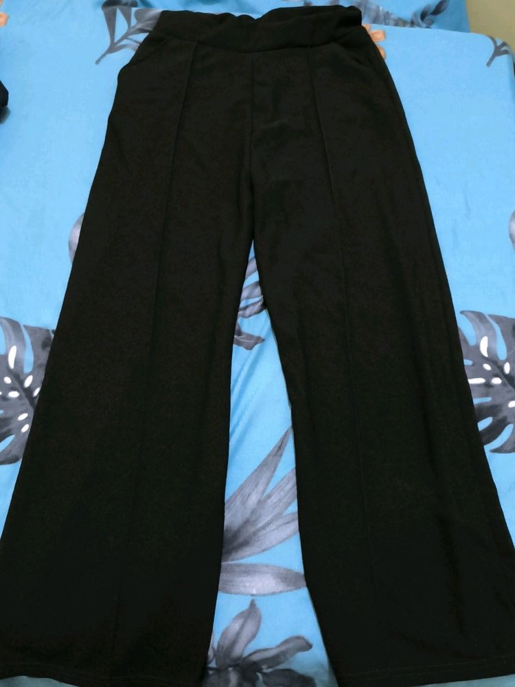 A Dark Olive Colored Flared Trouser