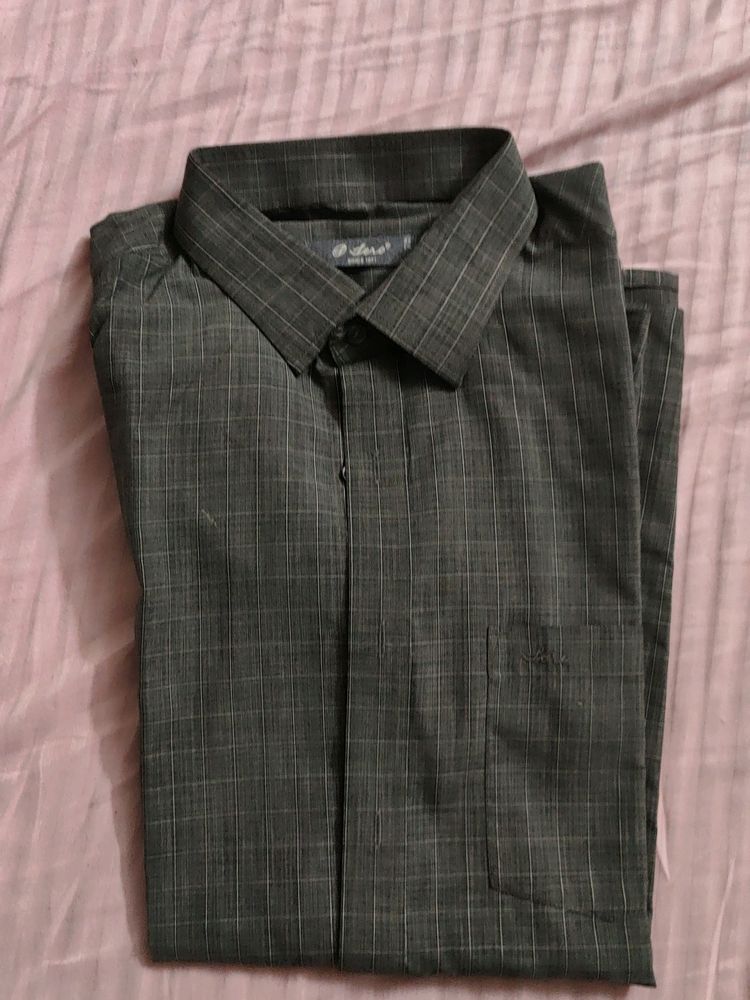 A Charcoal Colored Shirt