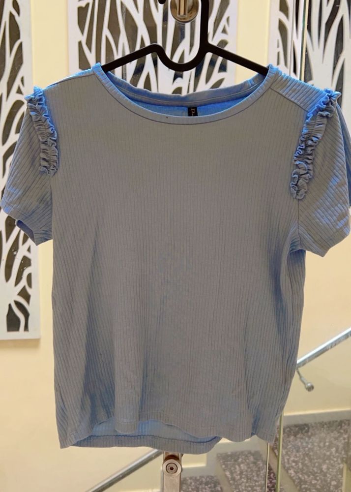 A Blue Shoulder Designed Top