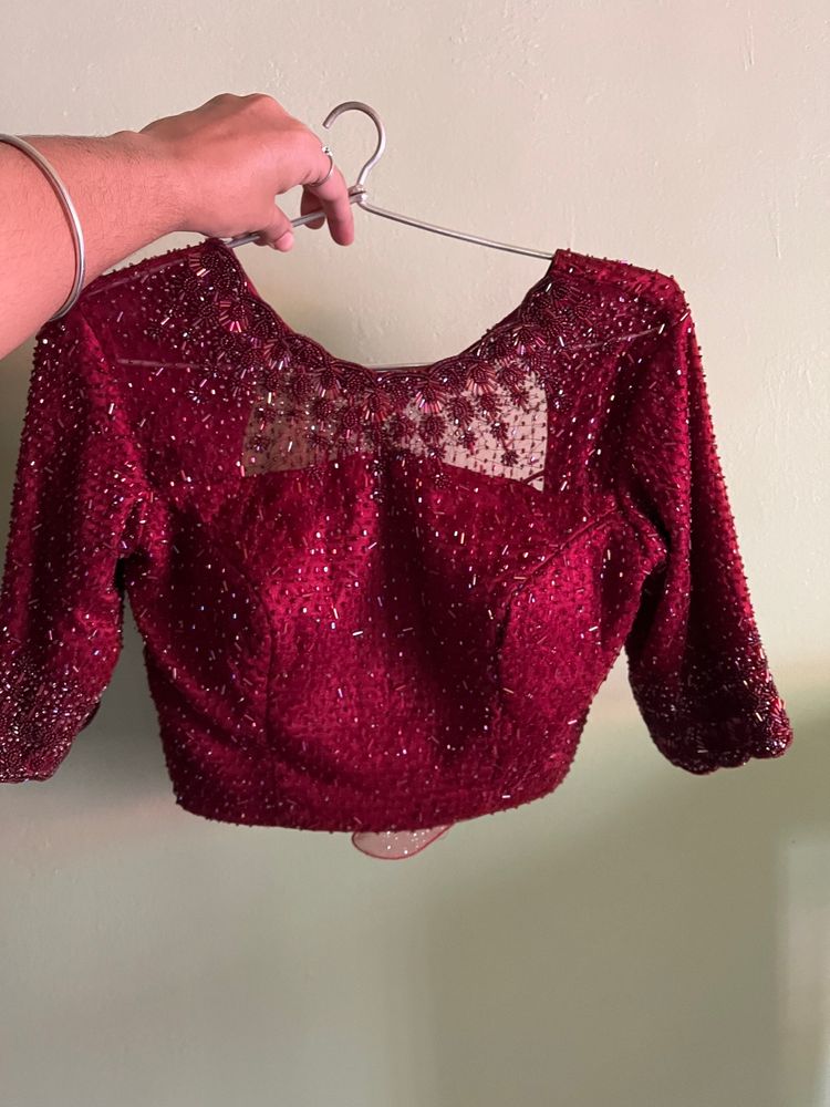 Heavy bead work blouse on maroon net