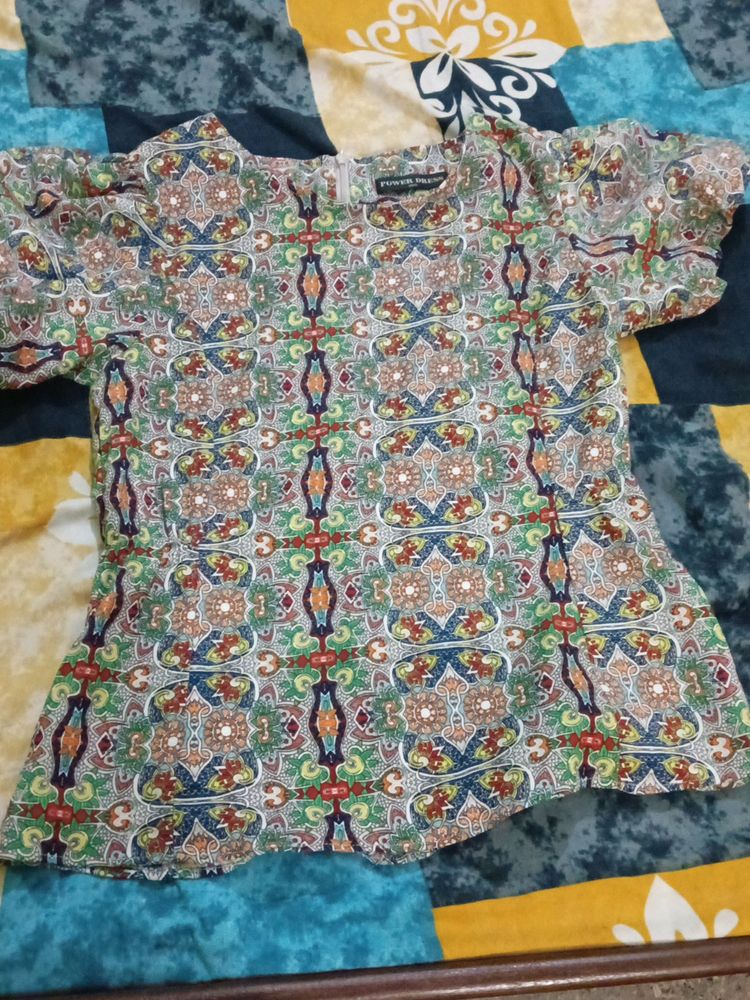 This Is A Multi Colour Top With Chain At Back