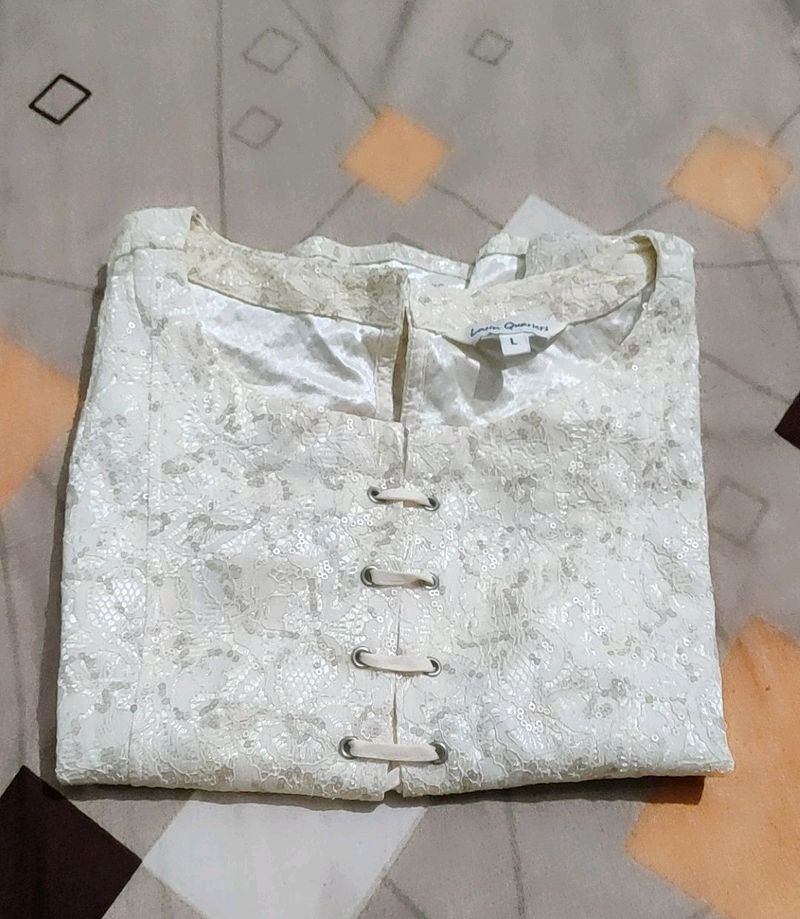 A Cream Colour Top