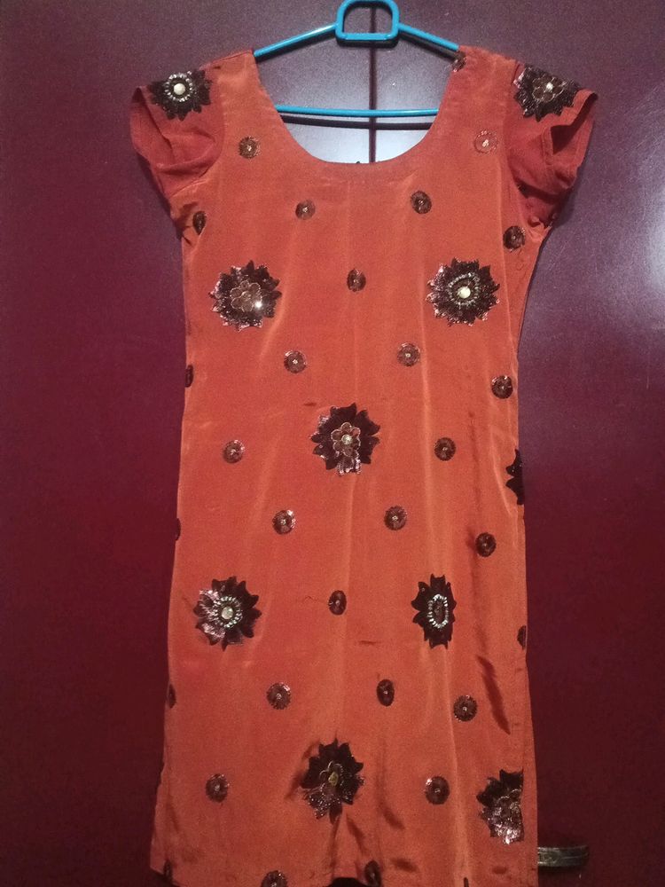 Dark orange Kurti with embroidery work