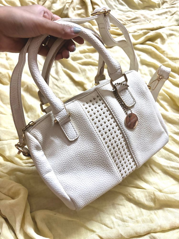 Lino Perros White Hand bag