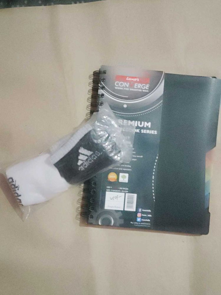 Selling Textbook And Pair Of Socks