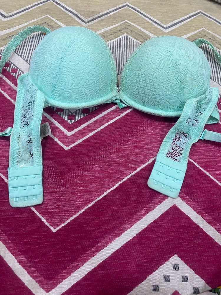 Light Green Color Puffy Bra Under Plastic Frame