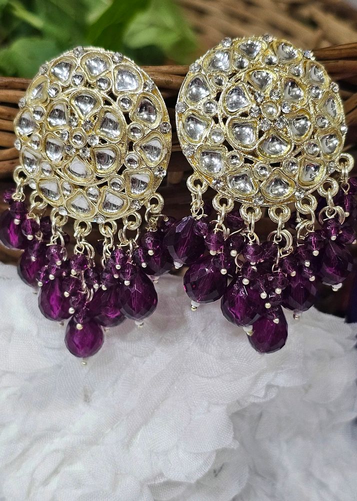 Golden Kundan With Purple Beads Earrings .