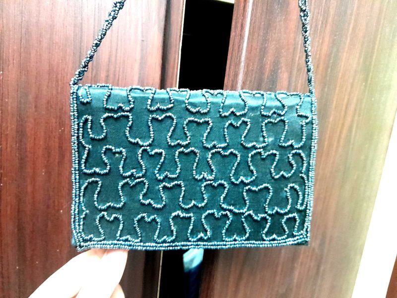 Embroidery Based Sling Bag