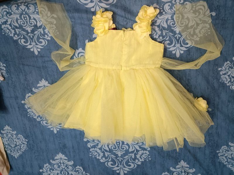 Yellow Flared Party Wear Frock For Baby Girls