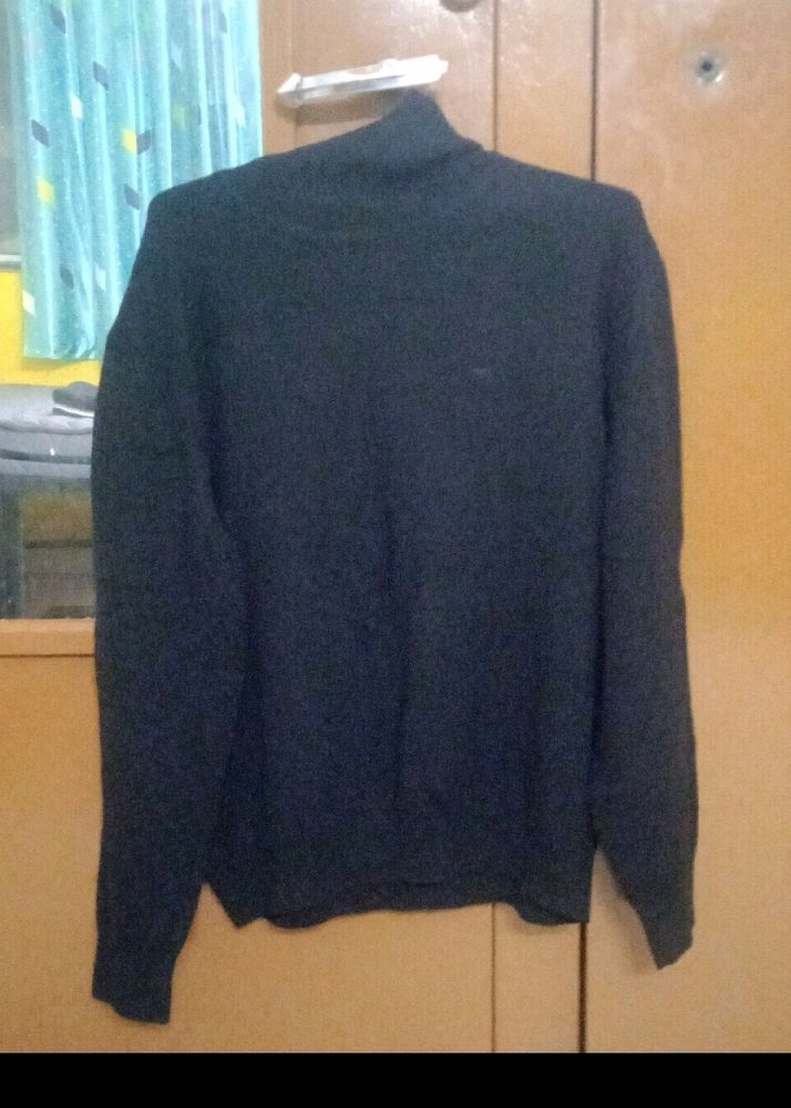 This Is A Turtle Neck Sweater In Good Condition