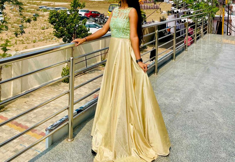 Festive Wear Sleeveless Gown With Embroidery Work