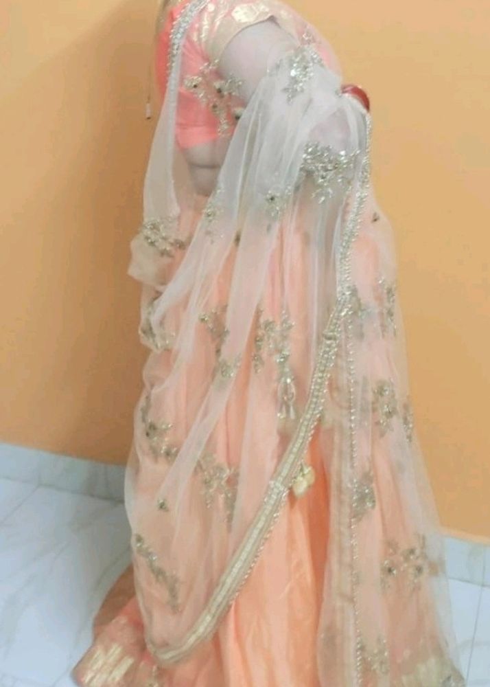 Orange And Golden Lehanga Choli