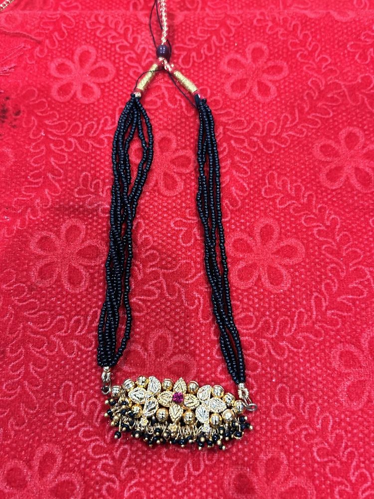 Designer Black Moti Golden Necklace