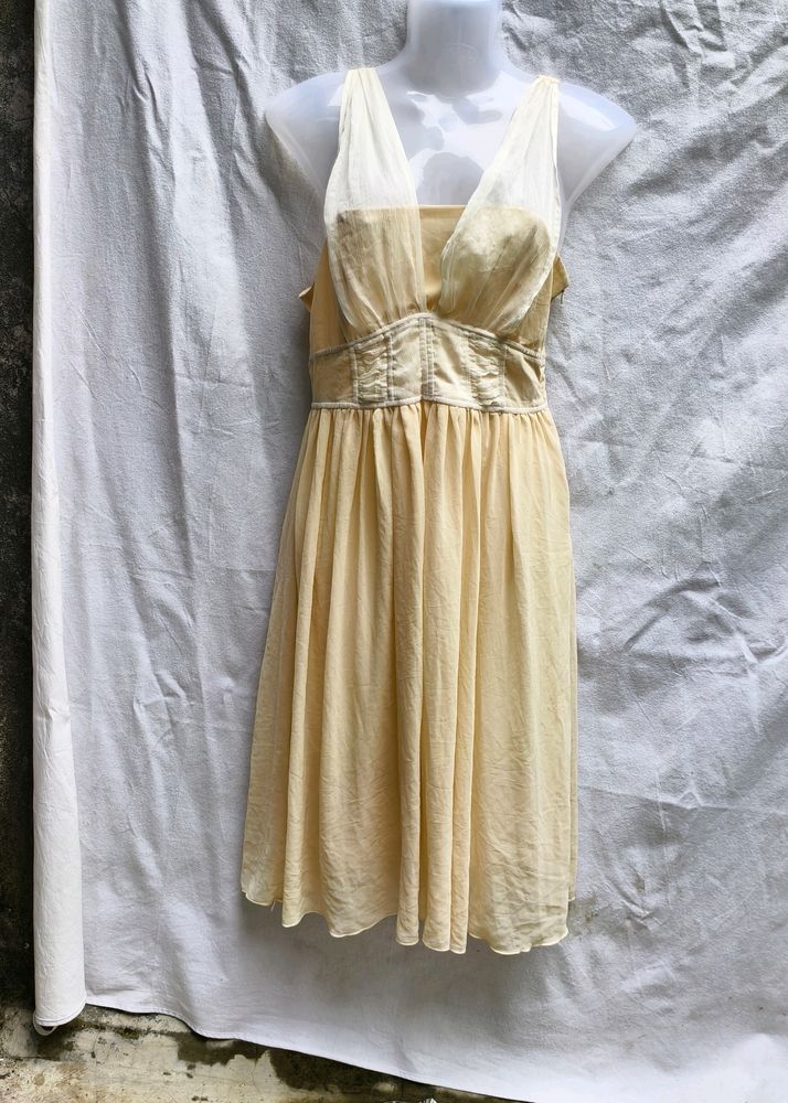 25W. CUTE CREME FROCK