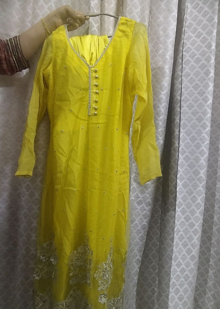 A Very New Yellow Coloured Net Suit With Pajami