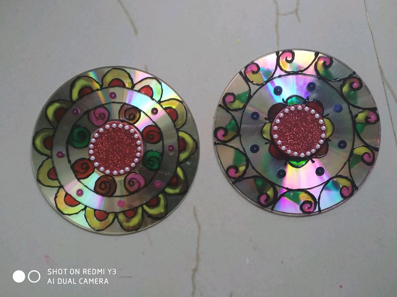 A pair of diya holders