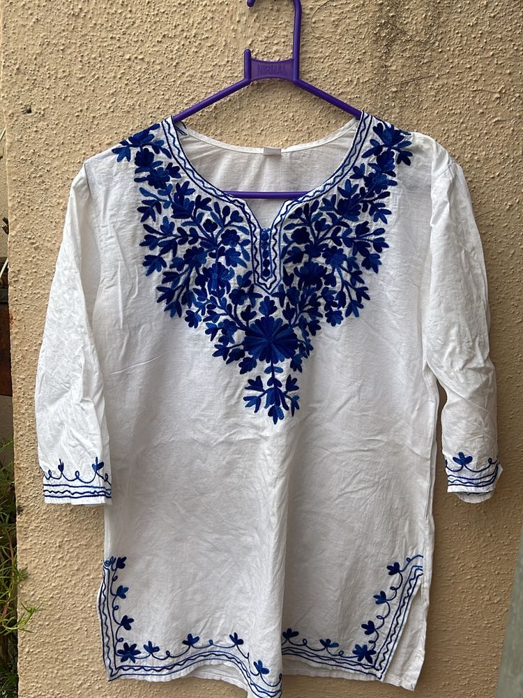 Short Kurti With Blue Work On It