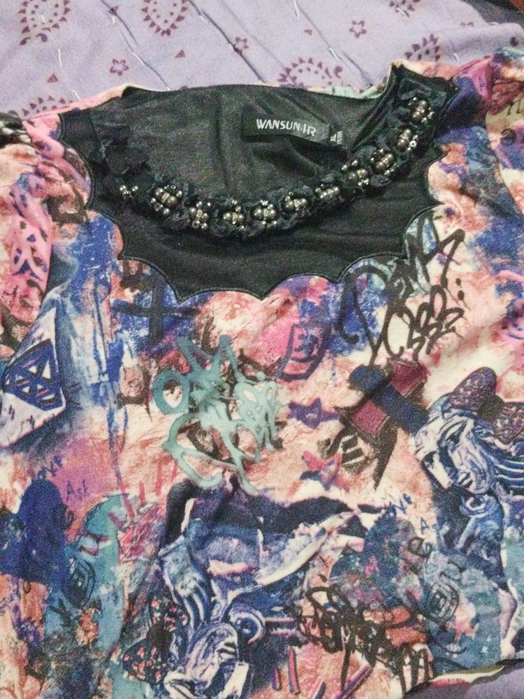 A multicolour top in good condition